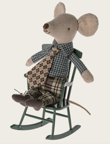 Stuffed mouse toy in a plaid outfit sitting on a rocking chair against a white background